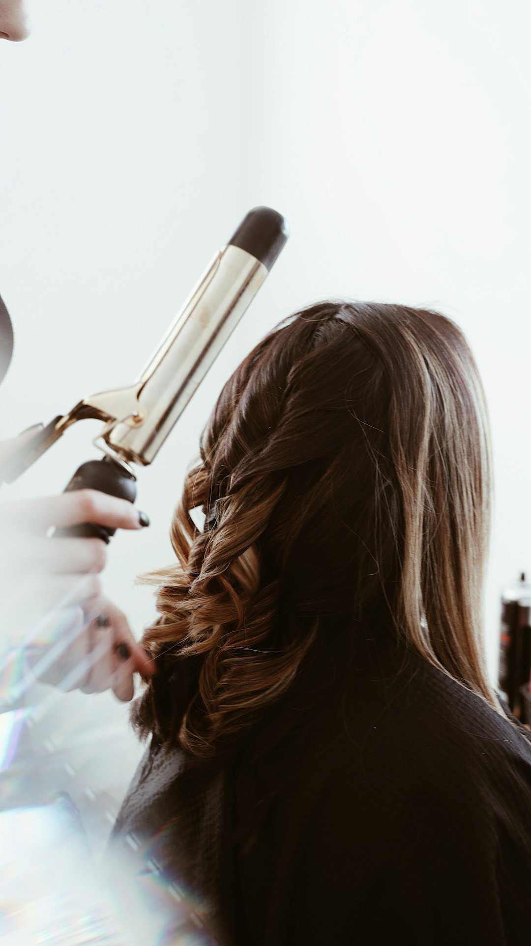 our-services-01 person-holding-gray-hair-curler-mmz03pycozg
